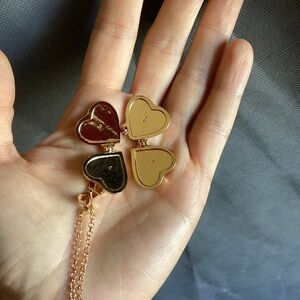 Four heart locket necklace in golden color (not precious metal)